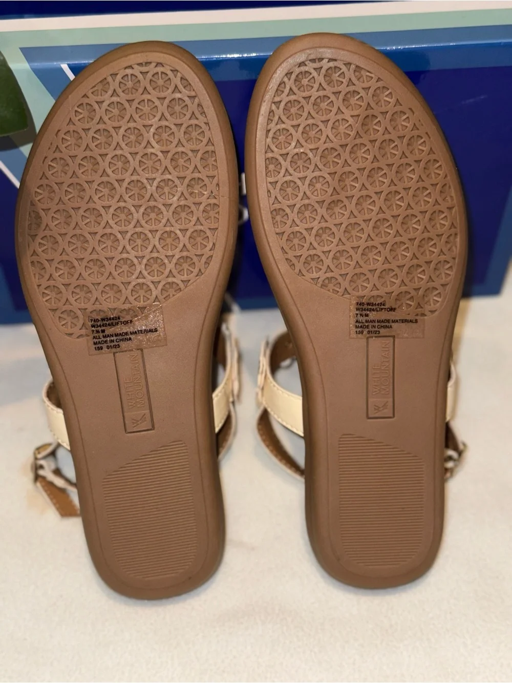 White Mountain Liftoff Flat Sandals feature delicate floral applique on T-strap
